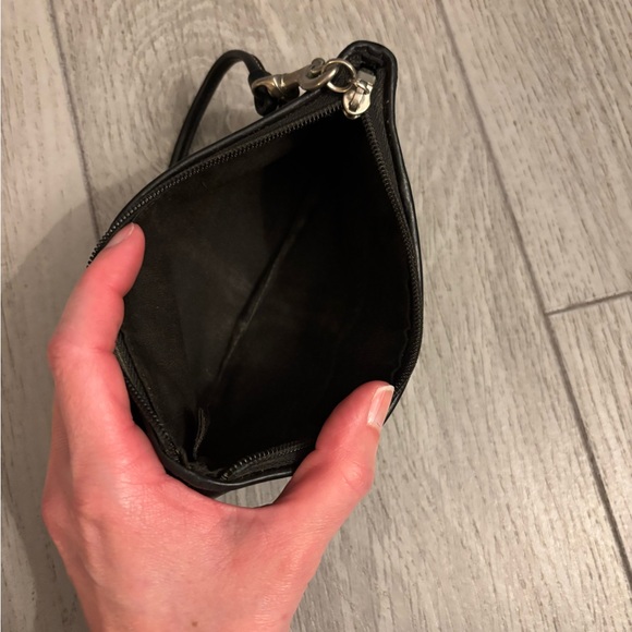 Coach wristlet in black leather. Hangtag present. EUC. - Picture 9 of 11